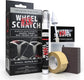 Wheel Scratch Fix Wheel Repair Kit with its retail box, touch-up paint applicator, masking tape, sanding block, and instruction card on a white background.